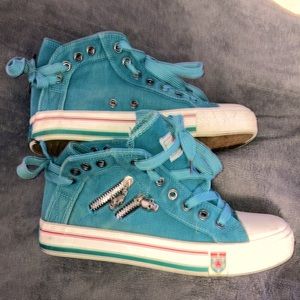Teal high top sneakers size 40. Red, white, and teal striped sole.